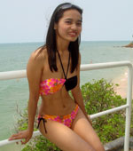 Thai girl Lana Lee having fun at the beach
