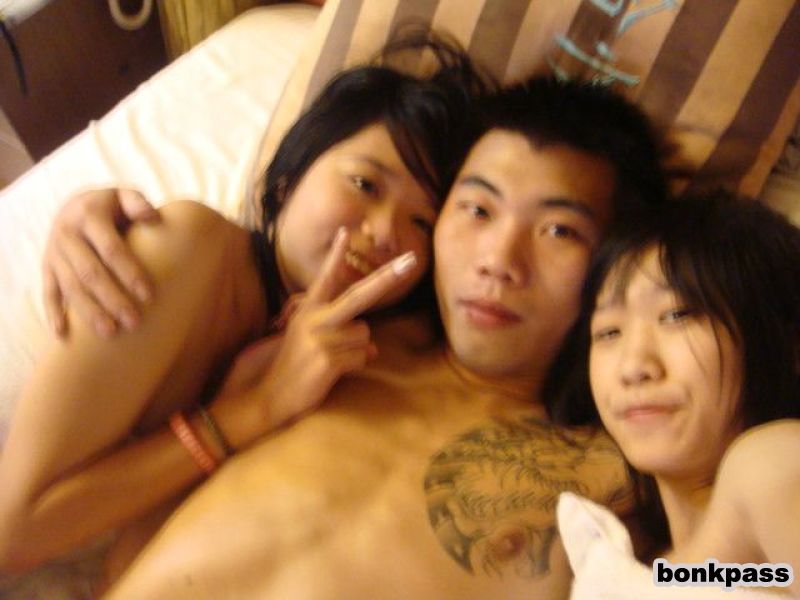 Threesome Two Girls Asian - Gangster looking guy with two naked Chinese girls | Asian ...
