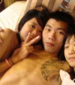 chinese-dude-with-tattoo-bonking-2-chicks-05